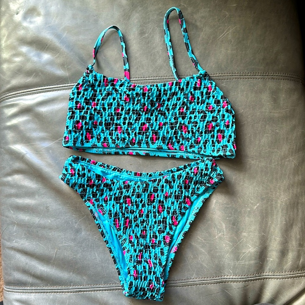 Super cute, brand new! Animal print, blue and pink bikini!
